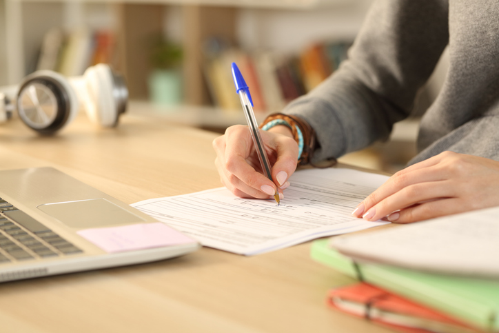 Student filling out an application