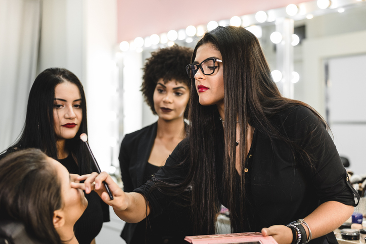 Makeup artist at work in a studio